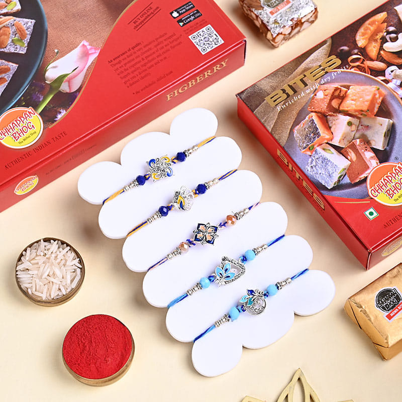 Five Designer Rakhis With Figberry N Mewa Bites