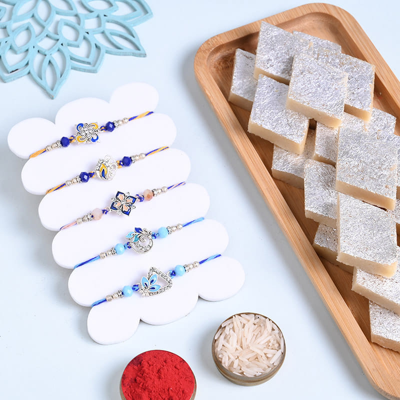 Five Floral N Morpankh Rakhis With Kaju Katli