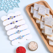 Five Floral N Morpankh Rakhis With Kaju Katli
