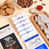 Five Pastel Charm Rakhis N Indulgence Hamper