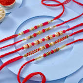 Five Pearls N Red Beads Rakhis