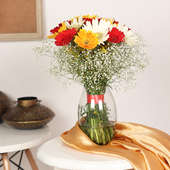 Flamboyant Sunflower Vase - 16 Mixed Gerberas in Glass Vase