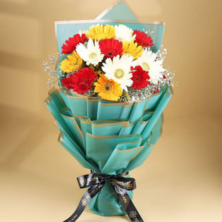 Flamboyant Sunflower Vase - 16 Mixed Gerberas in Glass Vase