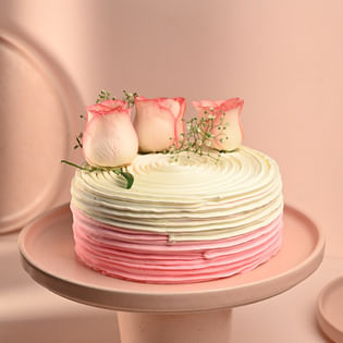 Side view of Flavorful Rose Adorned Cake