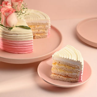 slice view of Flavorful Rose Adorned Cake