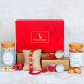 Flora Rakhi Signature Box - One Diamond Rakhi with Roli and Chawal and Roasted Cashews and 100gm Coconut Cookies and One Floweraura Signature Box