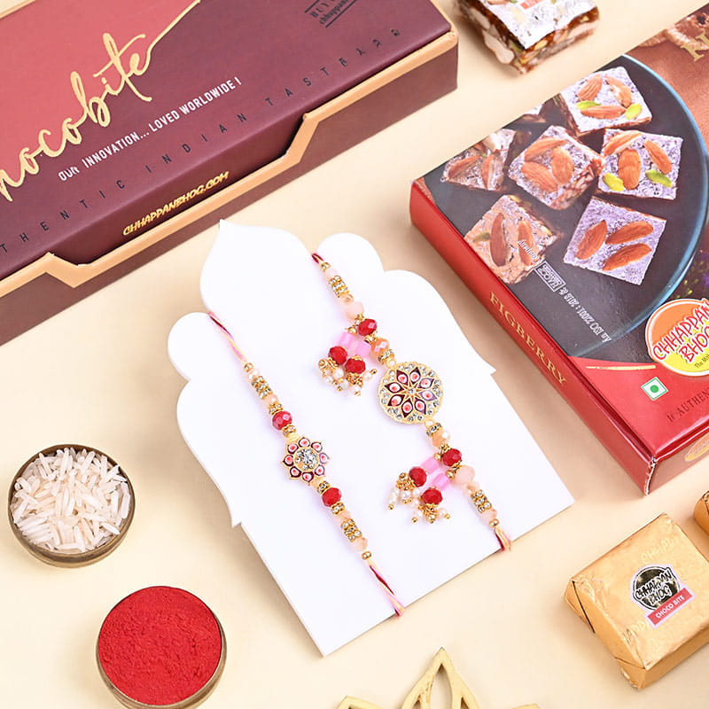 Floral Bhai Bhabhi Rakhi Set With Sweets