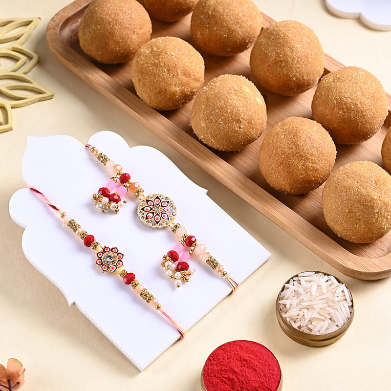  Floral Bhaiya Bhabhi Rakhi Set With Besan Ladoos