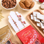 Floral Bhaiya Bhabhi Rakhi With Festive Treats