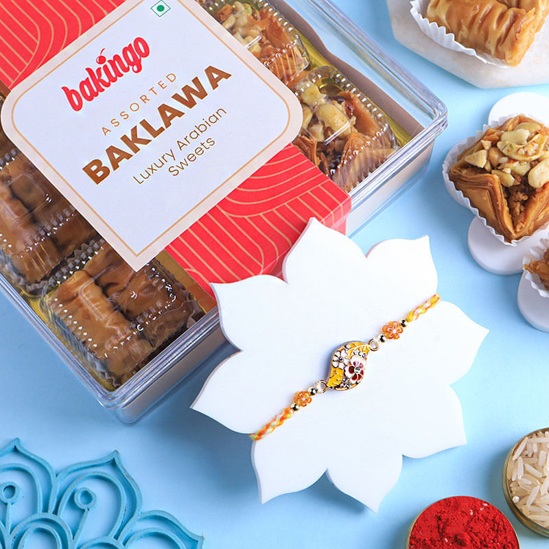 Floral Charm Designer Rakhi With Baklawa