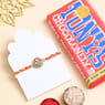 Buy Floral Designer Rakhi With Tonys Chocolate Online to Australia