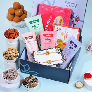 Floral Designer Rakhis With Treats Hamper