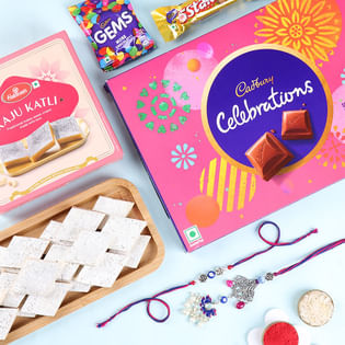 Floral Evil Eye Bhaiya Bhabhi Rakhi With Sweets