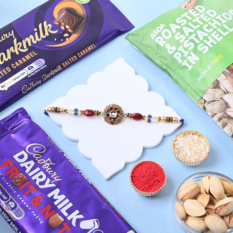 Floral Kundan Rakhi With Pistas N Cadbury Bars