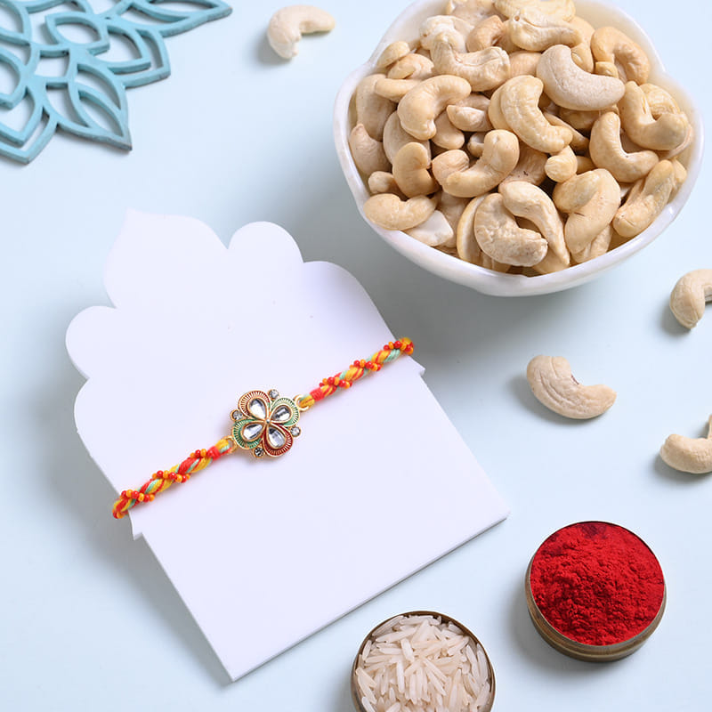 Floral Stone Rakhi With Cashews