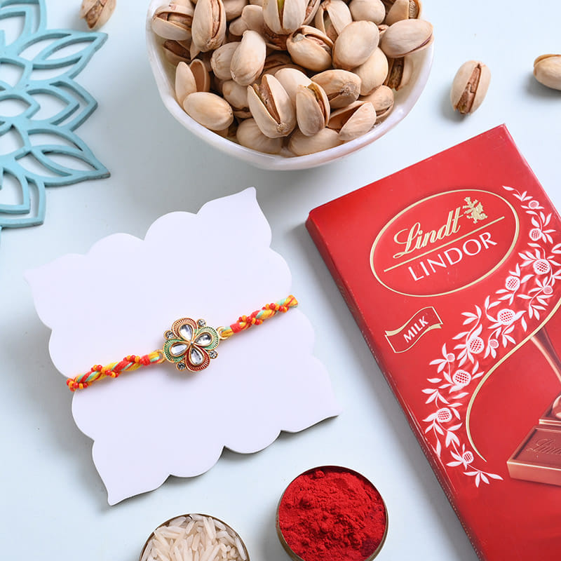 Floral Stone Rakhi With Chocolate N Nuts