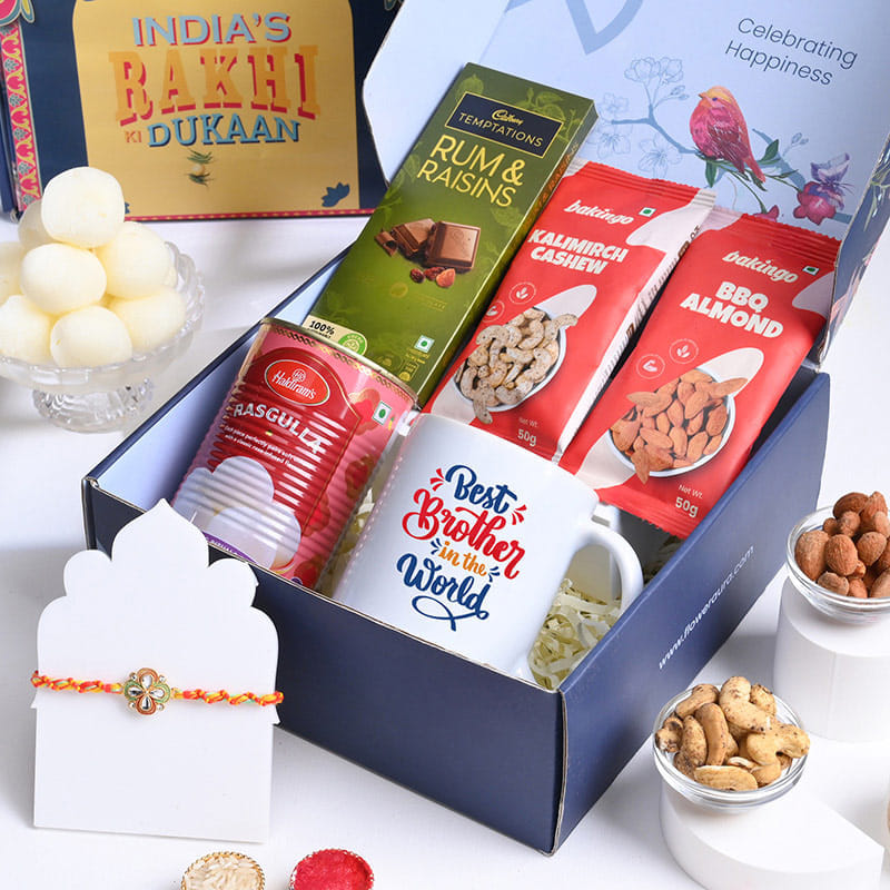 Floral Stone Rakhi With Gourmet Treats N Mug