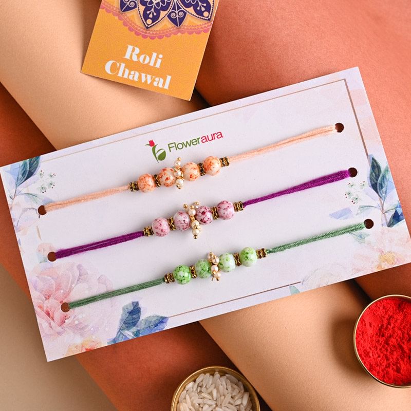 Buy Florescent Bedaded Rakhi Trio - Online Pearl Rakhi For Brother
