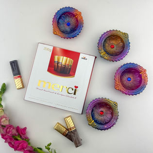 Four Handcrafted Diyas N Merci Chocolate