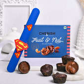 Send Quirky Rakhi Online For Kids with Dry Fruits - Fruit n Nut Clusters With Cool Superman Rakhi