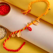 Yellow Red color rakhi up view
