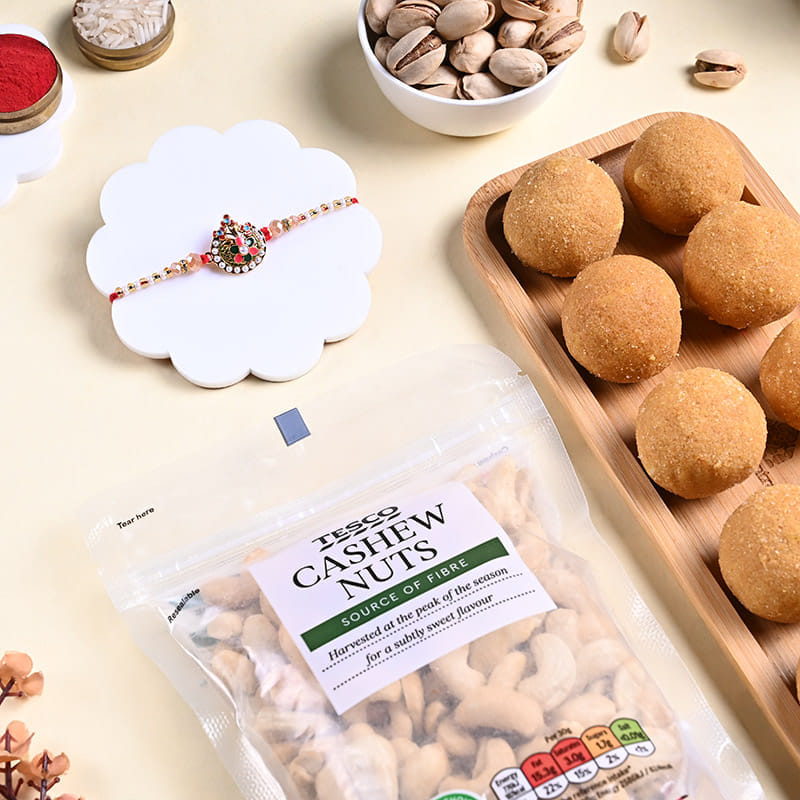 Ganesha Pearl Rakhi With Cashews N Besan Ladoos
