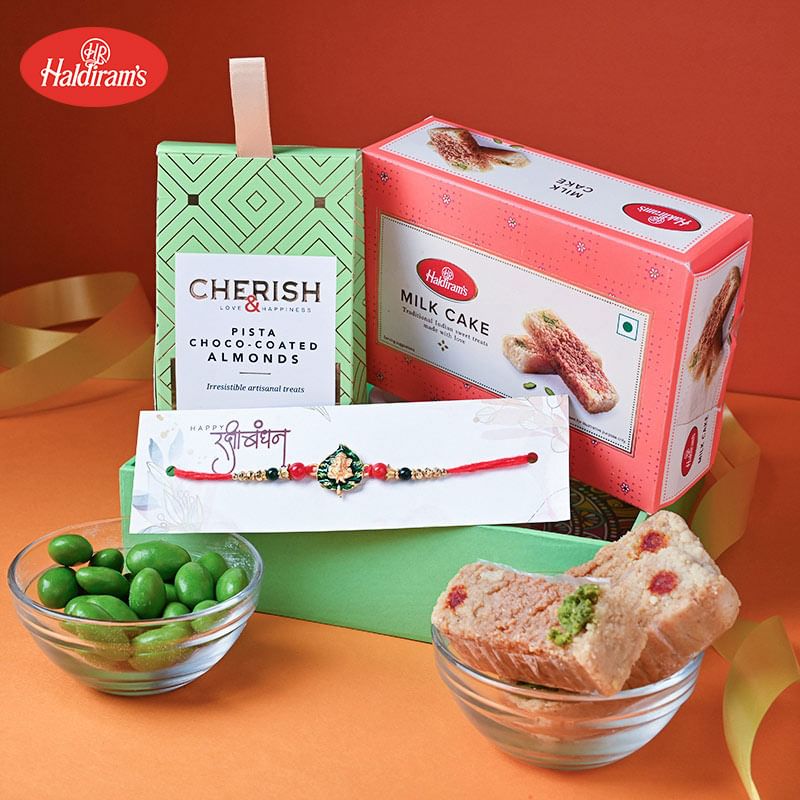 Ganesha Rakhi With Milk Cake N Choco Badam - Buy This Rakhi Combo Online