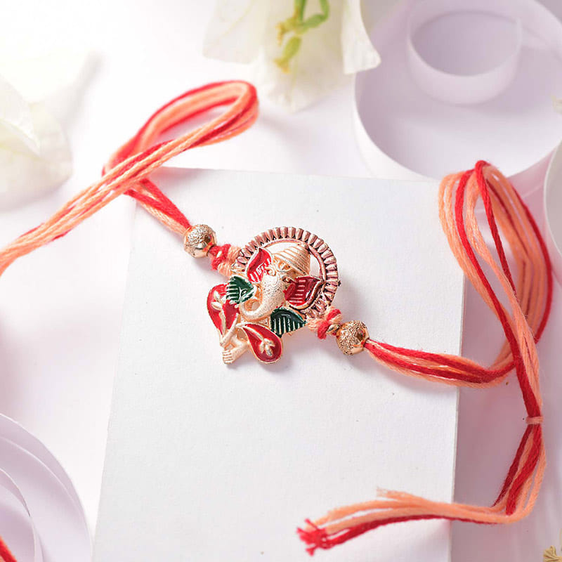 Ganesha Rakhi With Sweet N Salty Treats