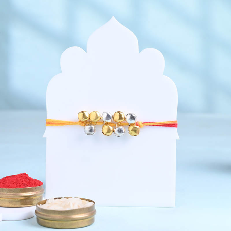 Ghungroo Bead Rakhi With Chana Badam Bite