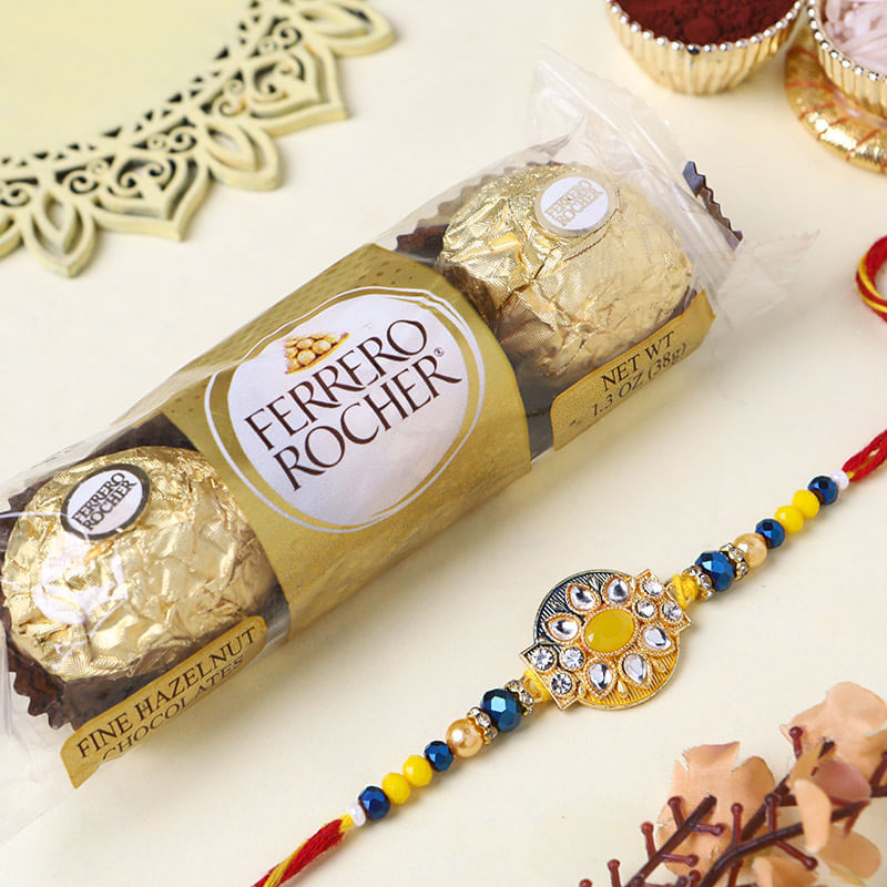 Gleaming Designer Floral Rakhi With Chocolates