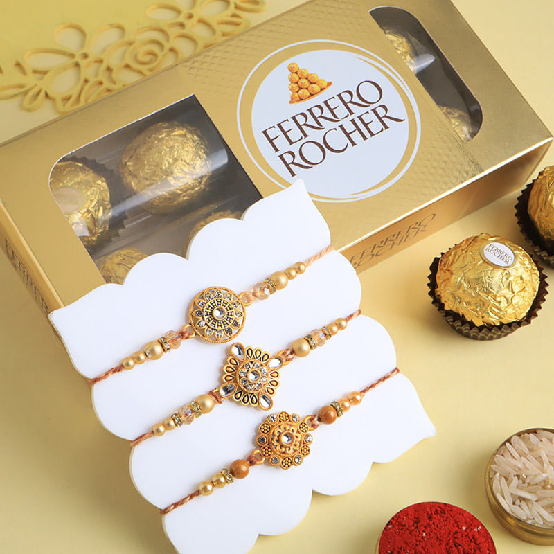Gold Tone Rakhi Trio With Chocolates
