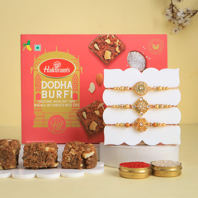 Gold Tone Rakhi Trio With Dodha Burfi