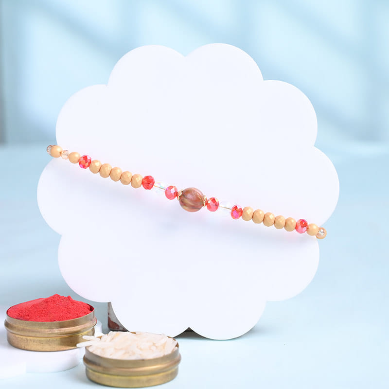 Golden Beaded Rakhi With Choco Almond Rocks
