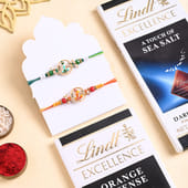 Two Golden Charm Rakhis With Lindt Choco Bars