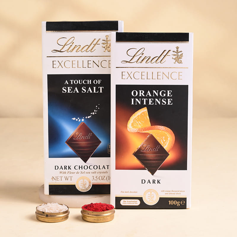 Two Golden Charm Rakhis With Lindt Choco Bars