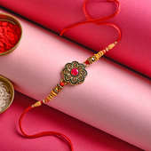 Floral Designer Rakhi online for brother in India - Golden & Red color