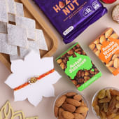 Golden Ganesha Mauli Rakhi With Nuts N Sweet Treats