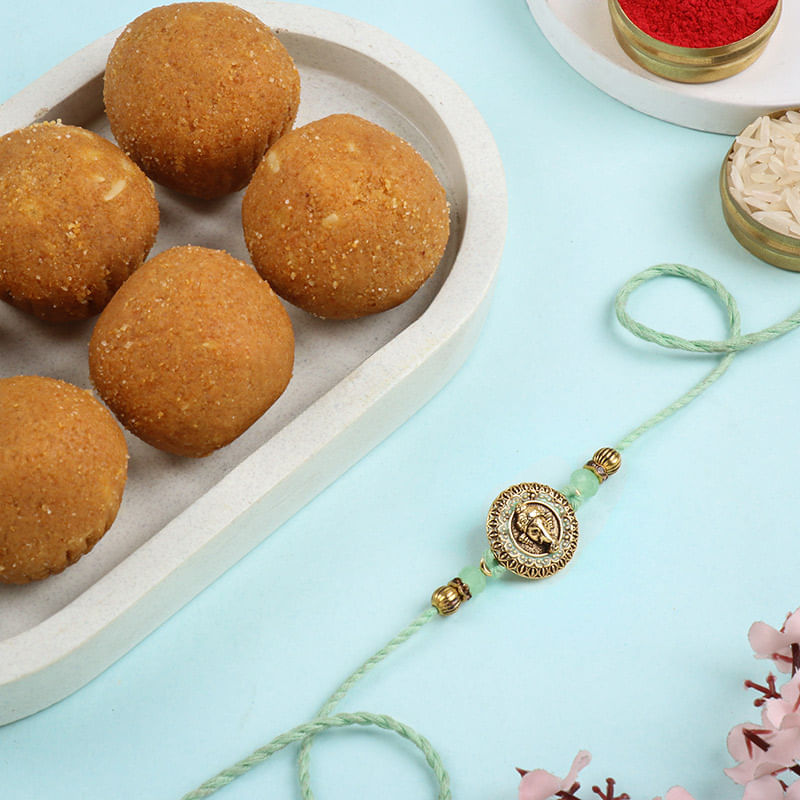 Golden Ganesha Rakhi With Laddoos-Singapore