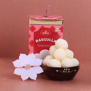 Golden Hamsa Dial Rakhi With Rasgulla Gift Box