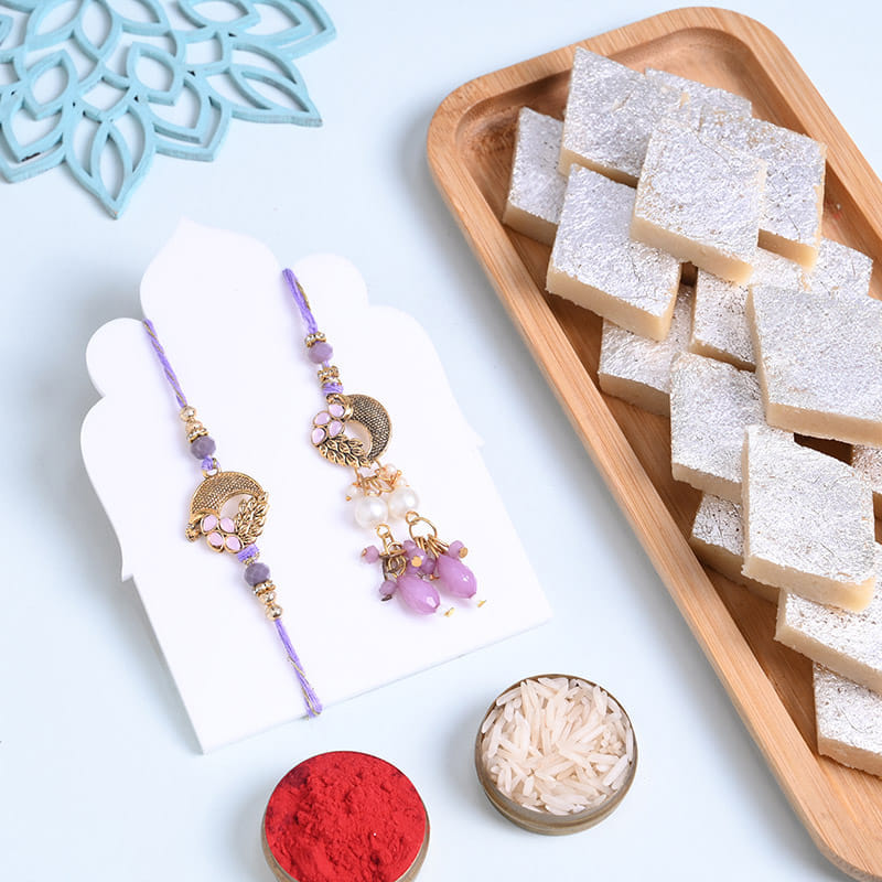 Golden N Purple Bhai Bhabhi Rakhis With Kaju Katli