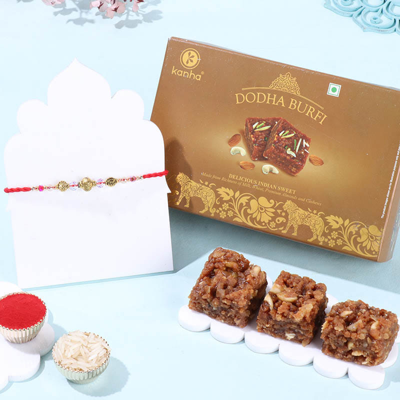 Golden Orb Rakhi With Dodha Burfi