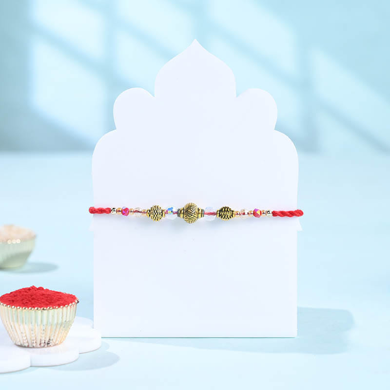 Golden Orb Rakhi With Dodha Burfi