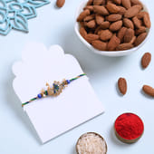 Golden Peacock Rakhi With Almonds