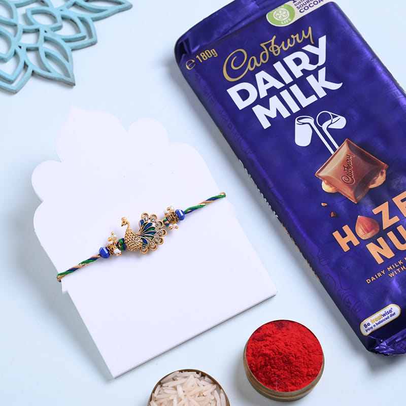 Golden Peacock Rakhi With Chocolate