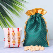 Golden Pearls Rakhi Combo - Set of 3 Designer Rakhi with Complimentary Roli and Chawal and 100gm Cashews in Green Potli