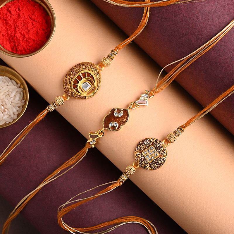Send Designer Golden Rakhi Trio Online - Fancy Rakhi