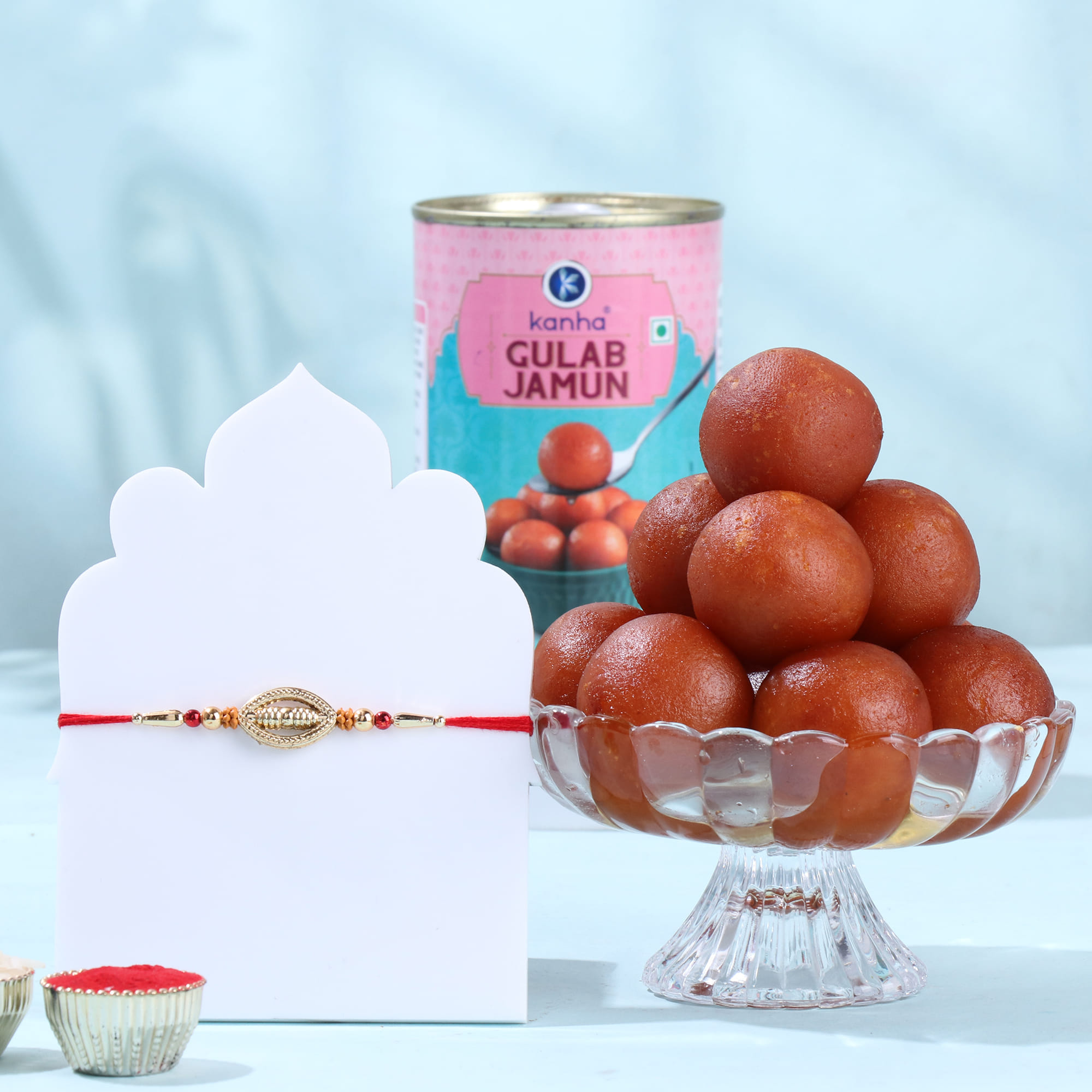 Golden Spiral Rakhi With Gulab Jamun
