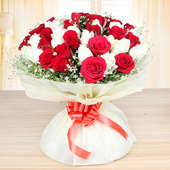 Front view of Gorgeous Blooms - Bunch of 25 red and 25 white roses