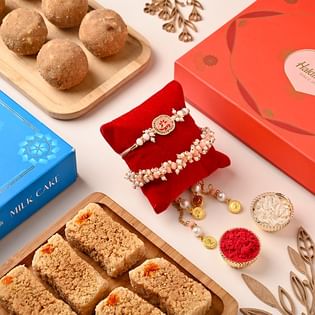 Graceful Bhaiya Bhabhi Rakhis With Sweet Delights 