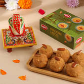 Graceful Chowki Ganesh With Ladoos